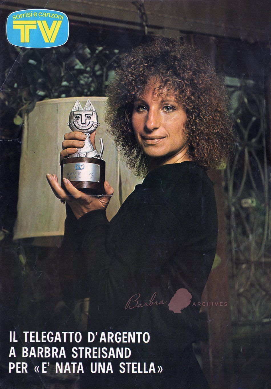 Streisand holds cat-like Telegatto Award
