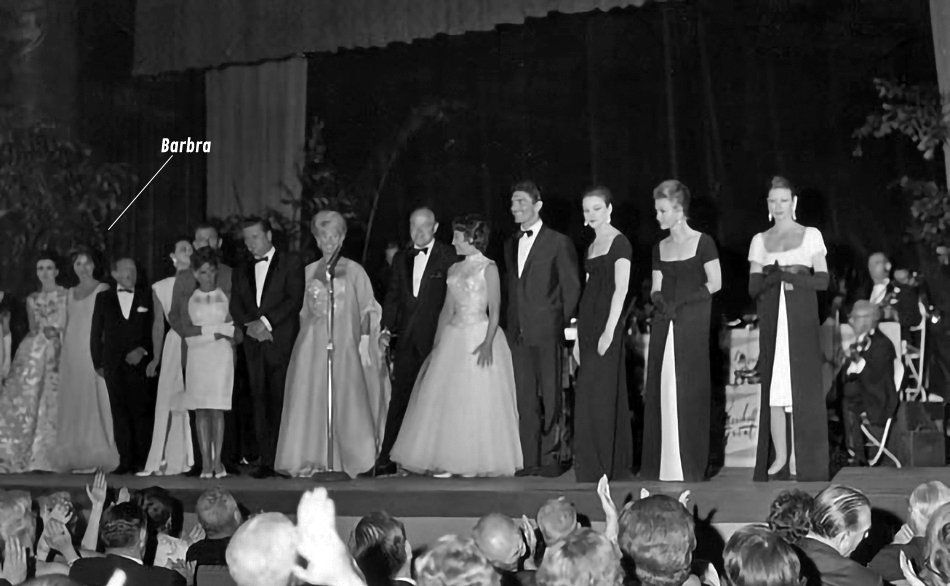 Streisand and other entertainers on stage at the Paramount Theatre