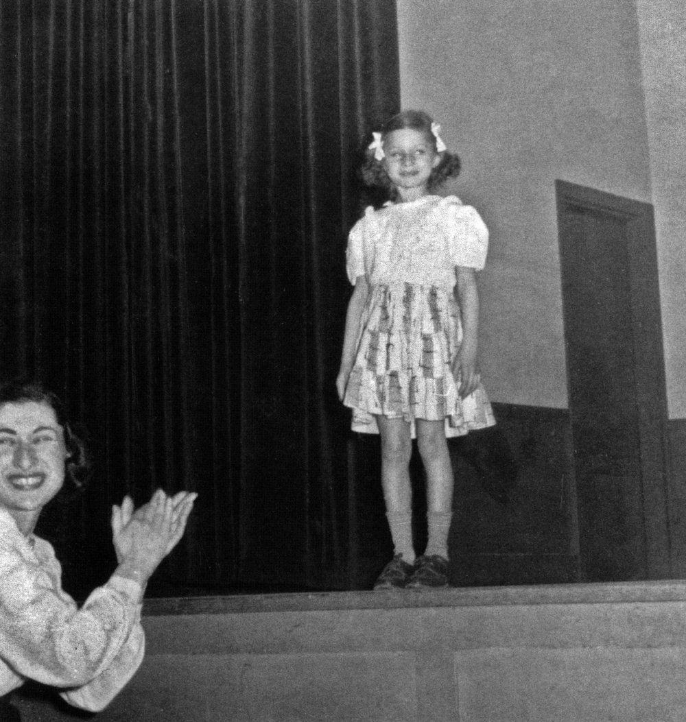 Streisand on stage singing at seven years old.