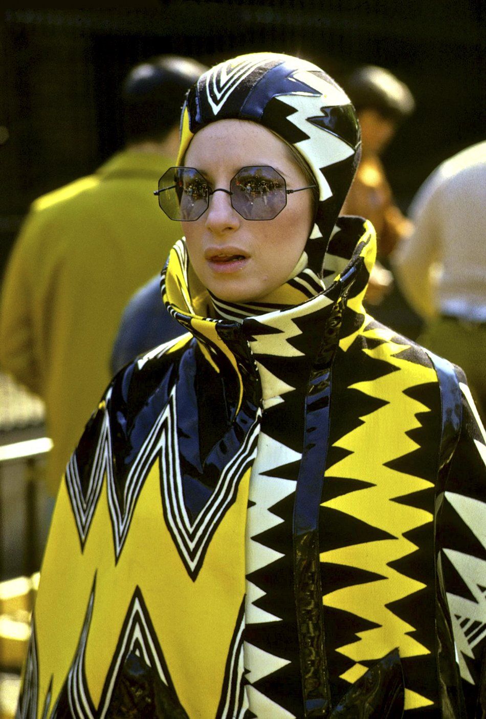 Streisand dressed in her crazy  yellow zebra outfit.