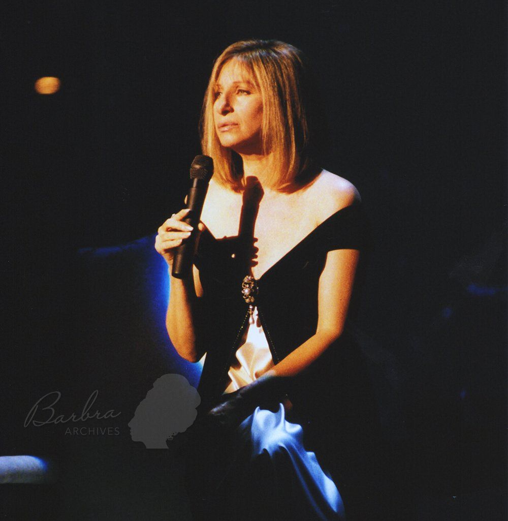 Barbra Streisand singing on stage