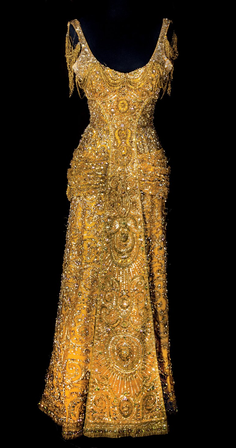 The beautiful gold gown designed by Sharaff