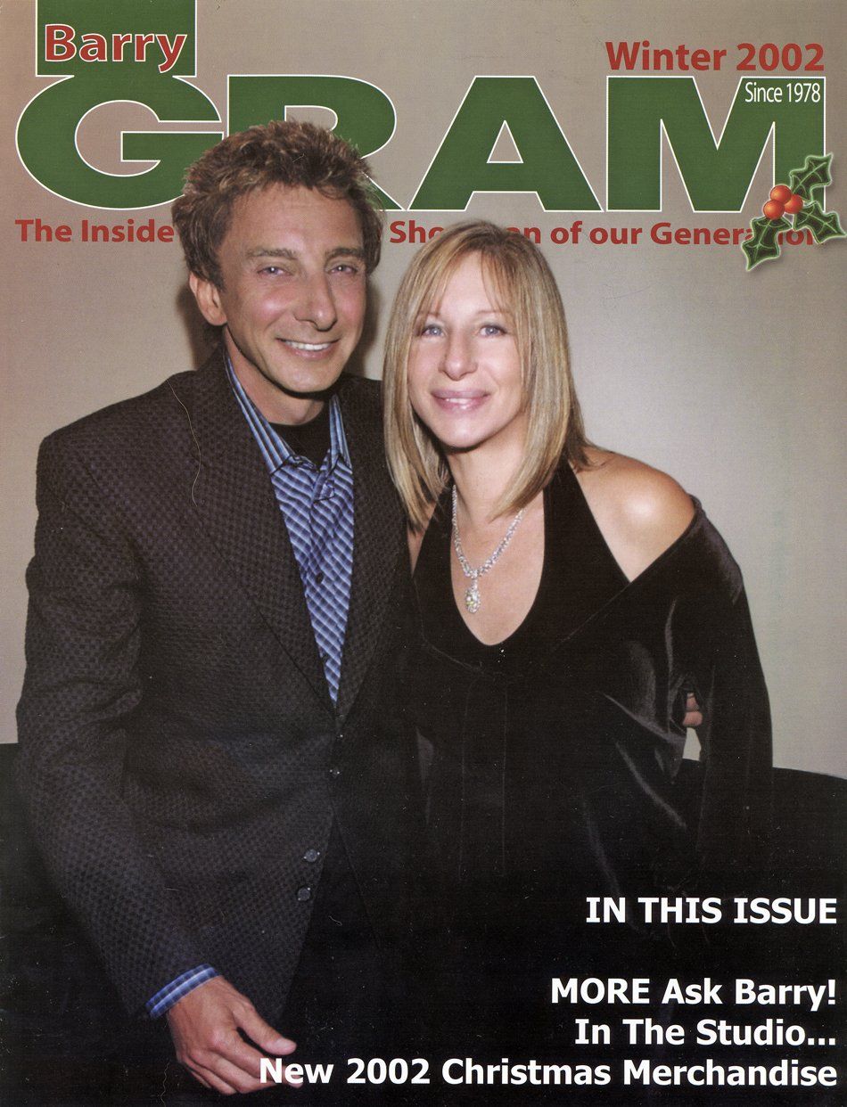 Barry Manilow and Barbra Streisand posing together. They appear on the cover of a Manilow Fanzine from 2002.