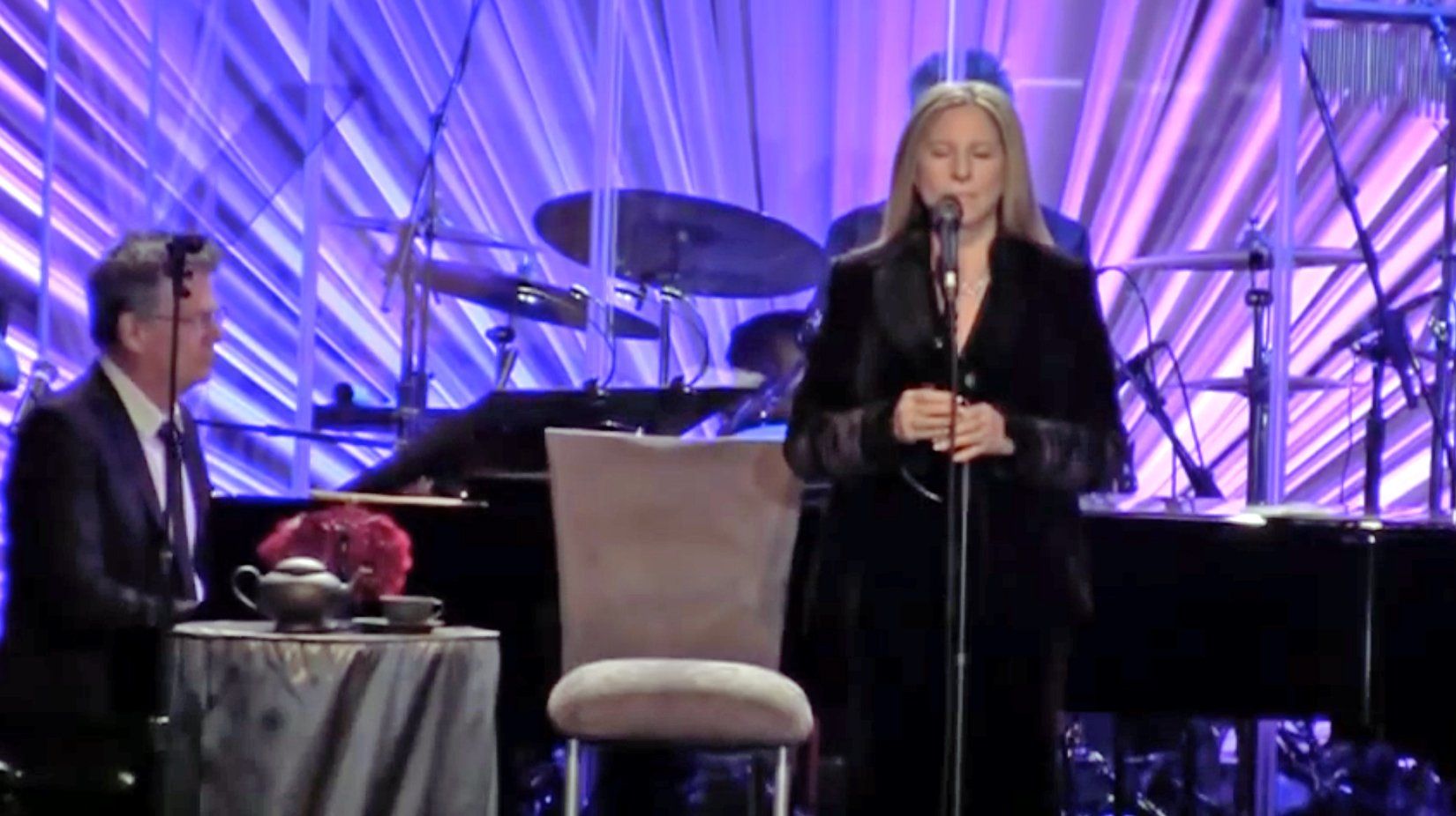 David Foster plays piano, Streisand sings.