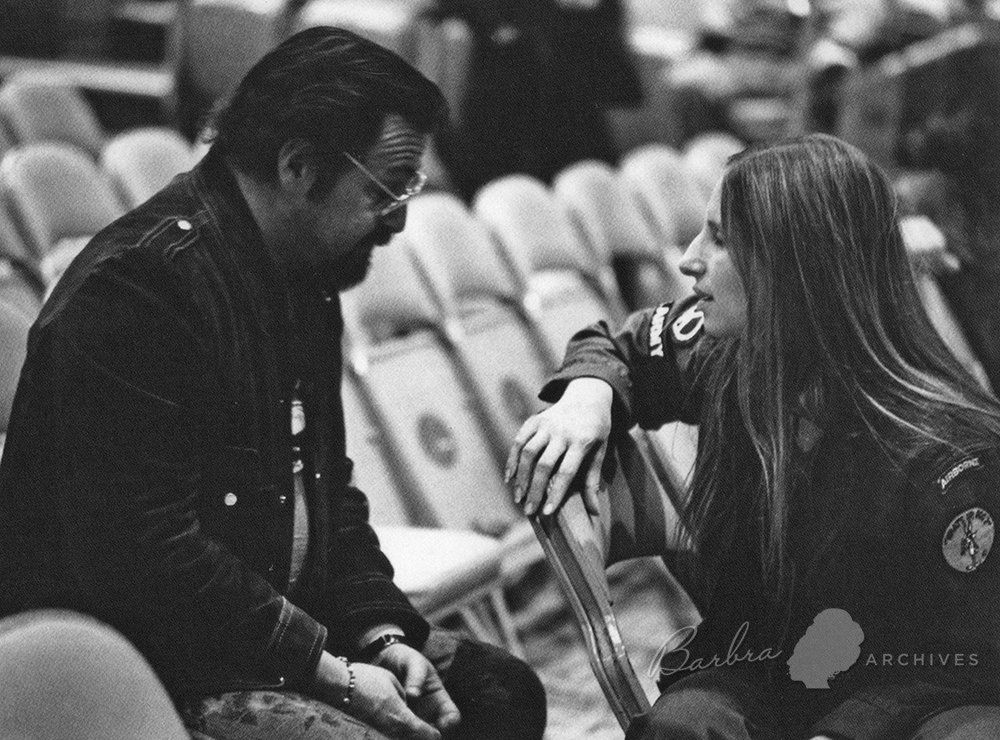 Marty Erlichman and Barbra Streisand confer during rehearsals for the concert.