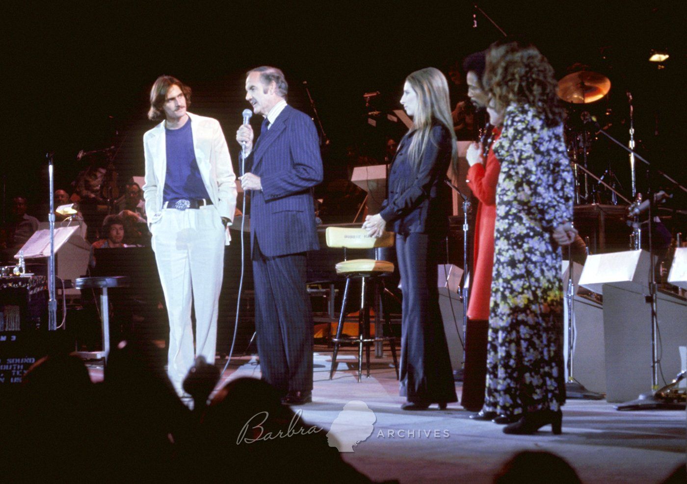 James Taylor, George McGovern, Streisand, Quincy Jones, and Carole King.