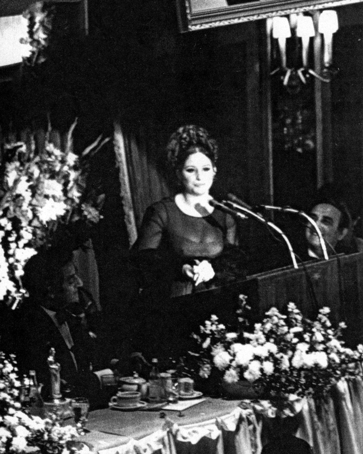 Barbra Streisand at the dais accepting her award