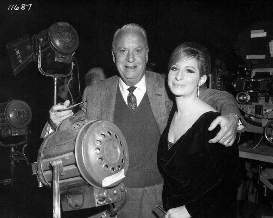 Streisand poses with Columbia Pictures exec, Mike Frankovich.