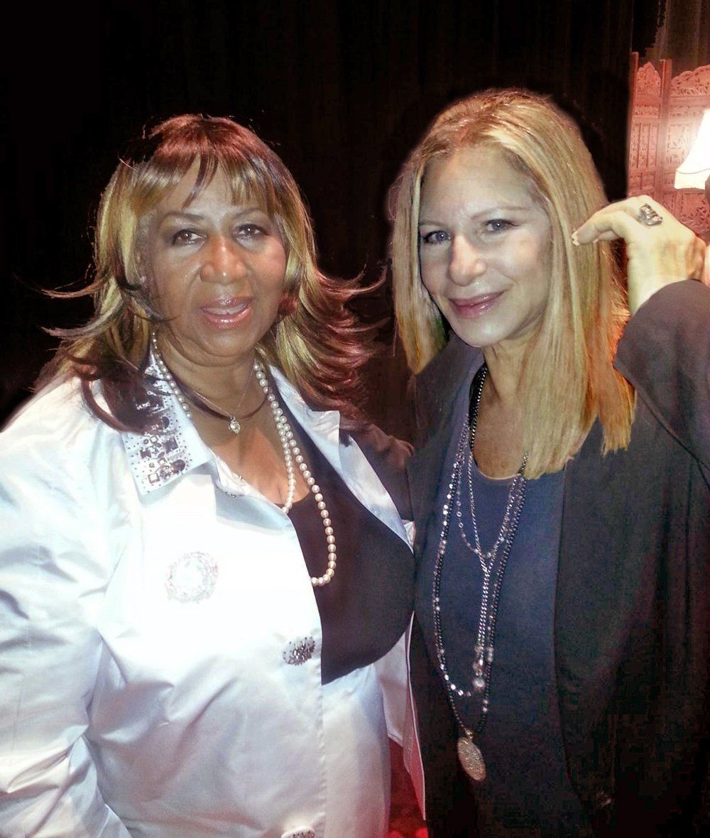 A rare photo of Aretha Franklin backstage with Barbra Streisand, 2012.