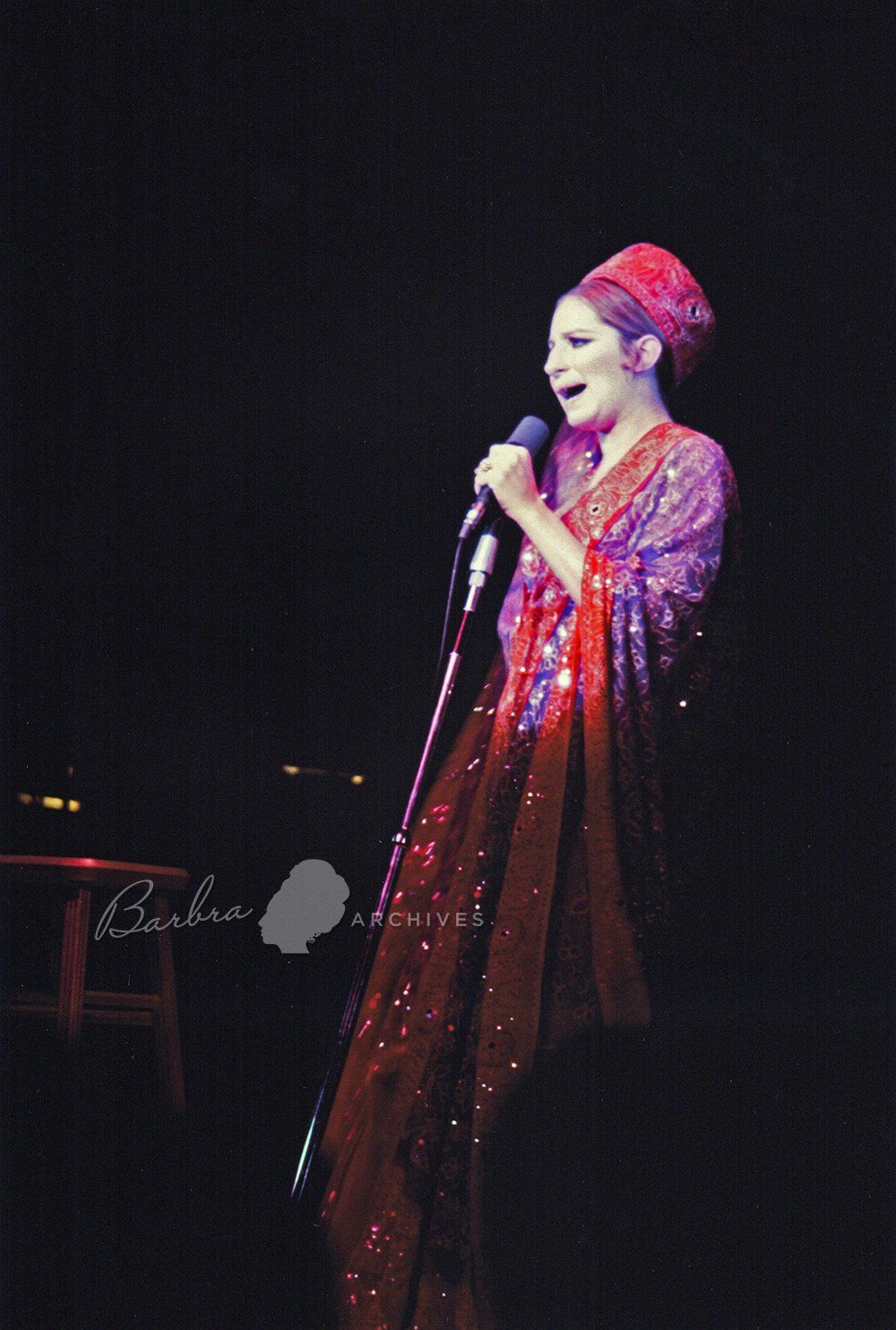 Streisand in a Scaasi-designed sari gown with matching hat.  Photo by: Borsari.