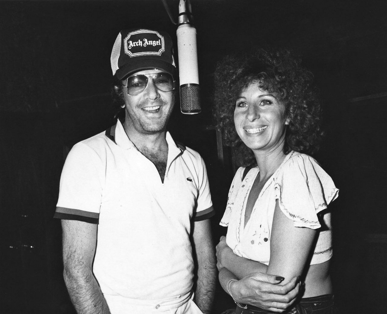 Diamond and Streisand, dressed casual, record their duet in 1978.