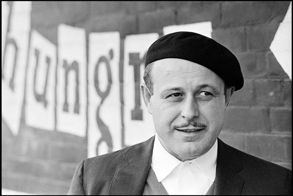 Photo of Enrico Banducci in front of the hungry i. Photo by Burt Glinn.