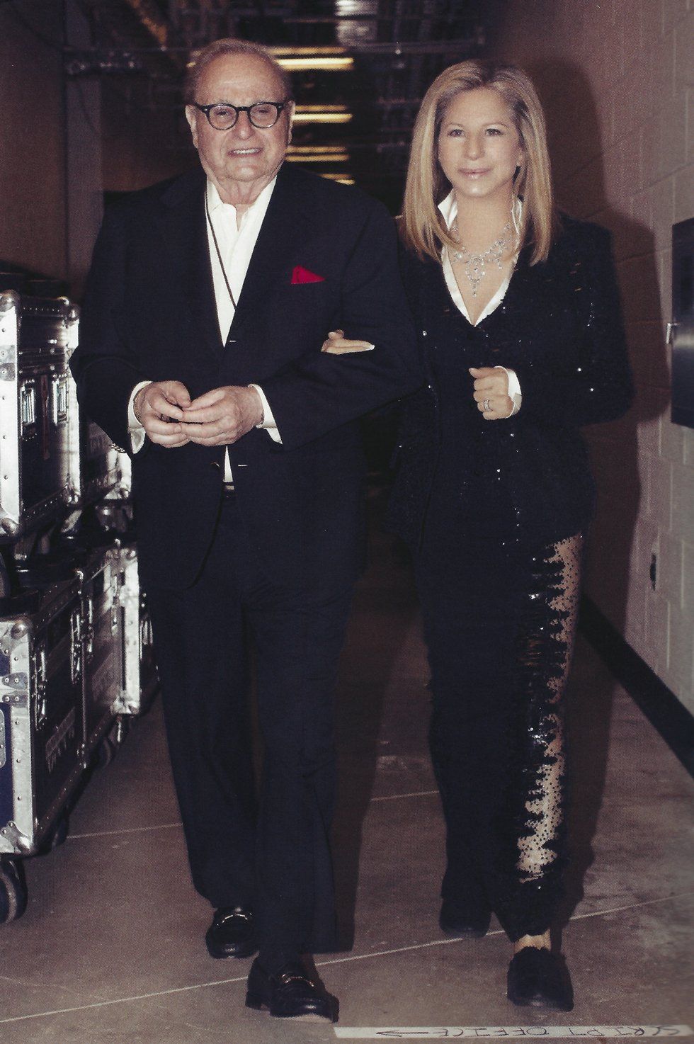 Marty Erlichman and Barbra Streisand pose together backstage.