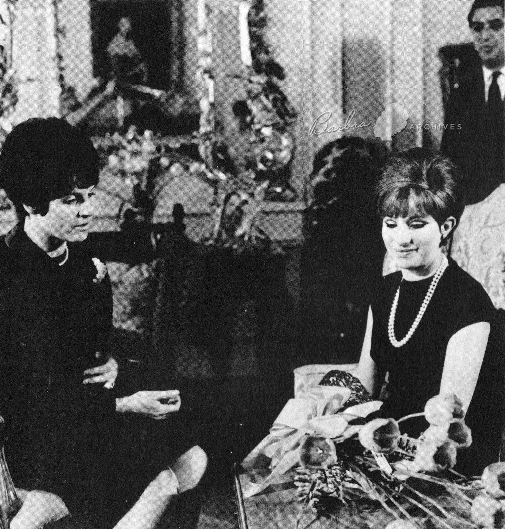 Mies Bouwman presents tulips to Barbra Streisand in 1966.