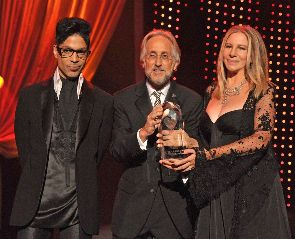 Prince, NARAS President Neil Portnow and 2011 MusiCares Honoree Barbra Streisand. Photo: Kevin Mazur