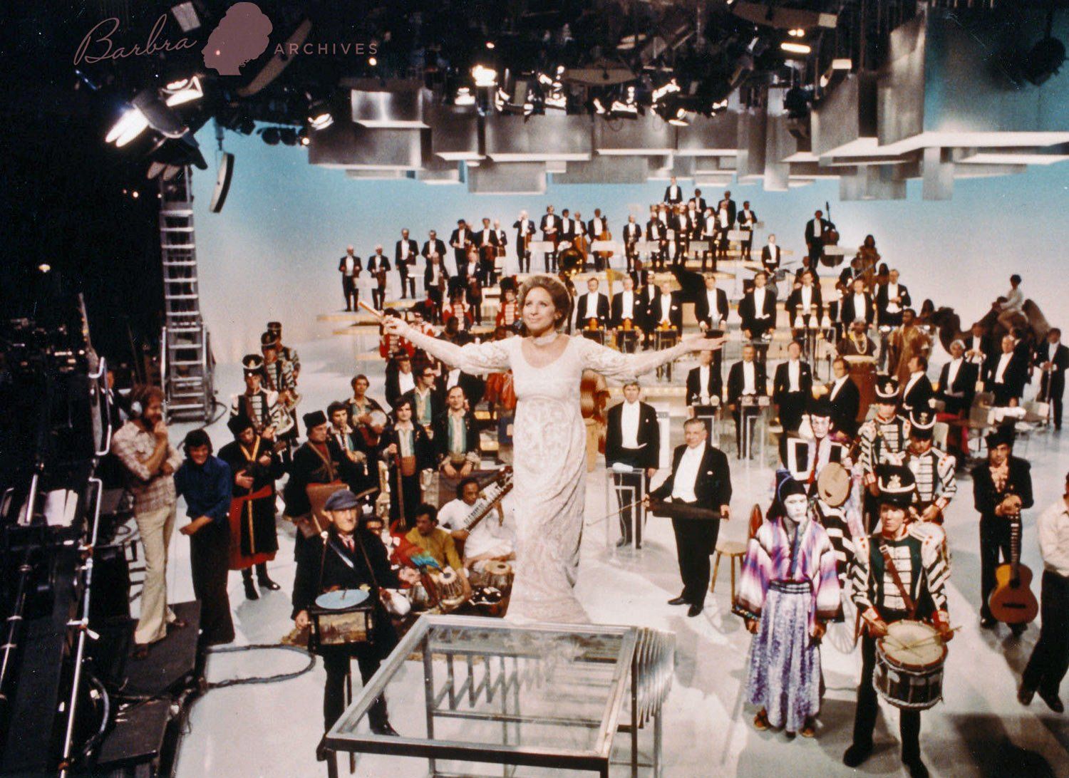 Full photograph of Streisand and musicians and crew, which was used for the cover shot.