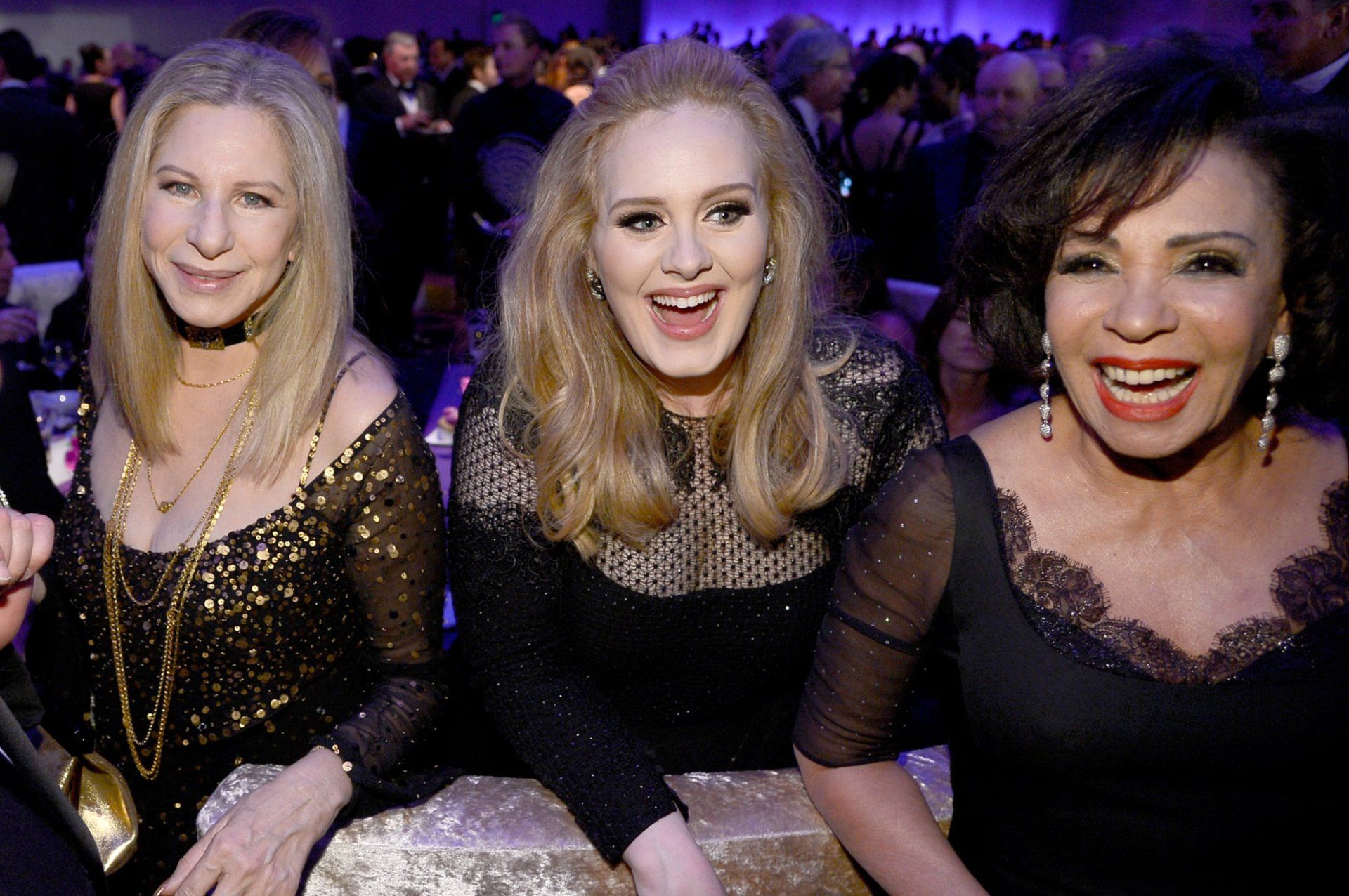 Streisand, Adele, and Shirley Bassey smile for the photographer at the 2013 Academy Awards.