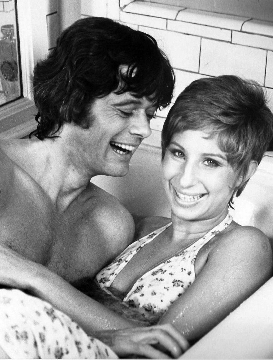 Michael Sarrazin and Barbra Streisand film a scene in Pete's bathtub