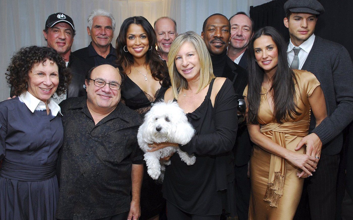 Backstage at Planet Hollywood. BACK ROW: Sylvester Stallone, James Brolin, Tracey Edmonds, Bruce Willis, Eddie Murphy, Kevin Spacey, Ashton Kutcher.  FRONT ROW: Rhea Perlman, Danny DeVito, Streisand and Demi Moore. Photo by Albert Ferreira