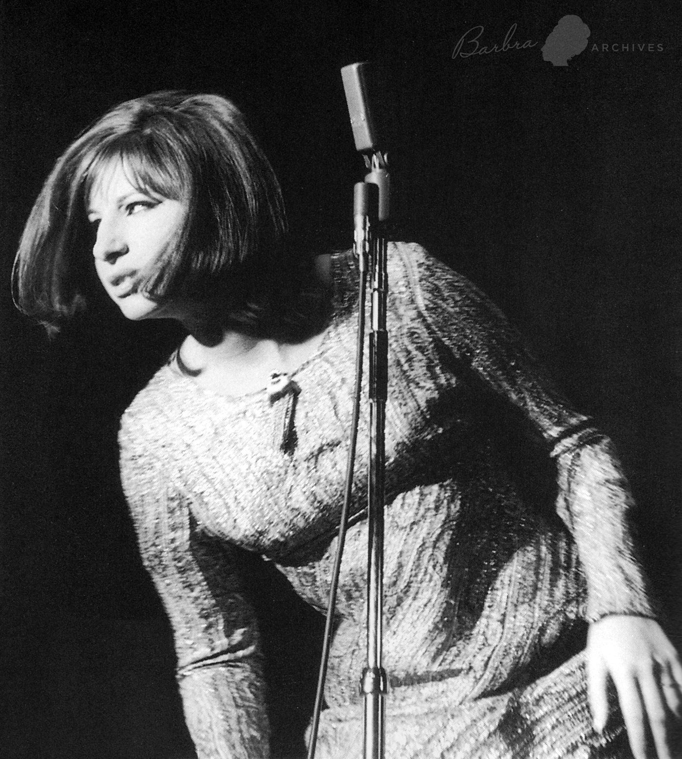 Streisand at the microphone at the Riviera Las Vegas