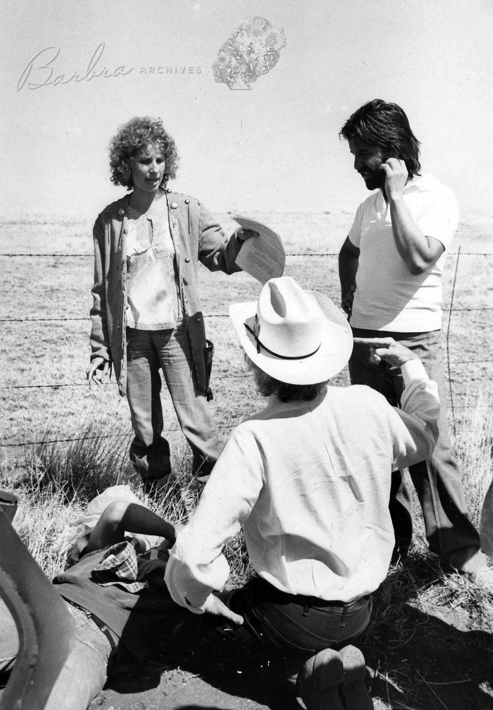 Streisand, Pierson (back to camera) and Jon Peters filming a scene on location.