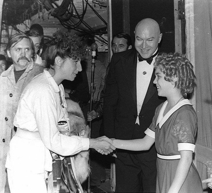 Streisand shakes Andrea McArdle's hand backstage at Annie.