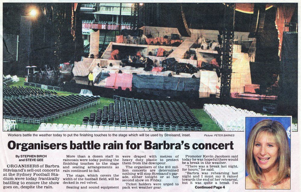 Newspaper clipping about rain postponing Barbra's first Sydney concert.