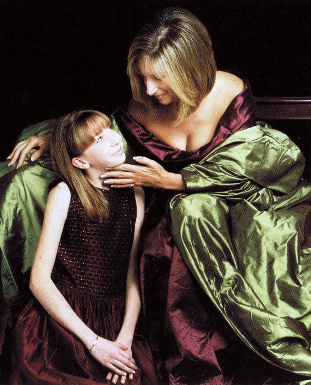 Lauren Frost and Barbra Streisand in her burgundy taffeta gown.