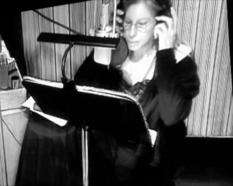 Barbra on the monitor at the recording studio.