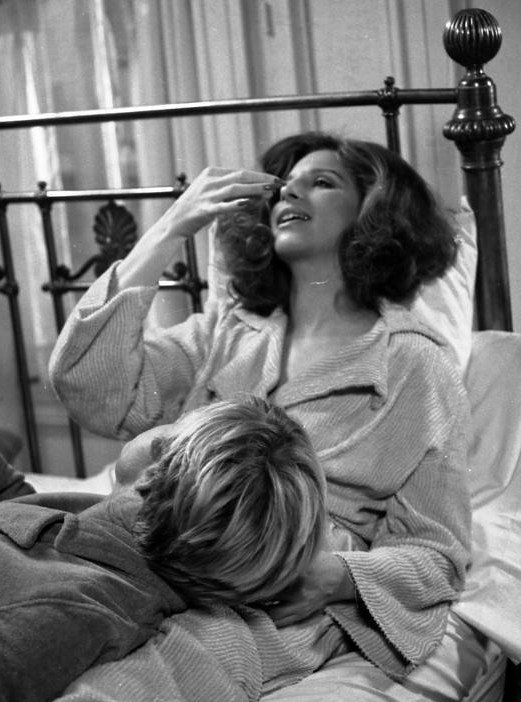 Katie and Hubbell in bed, cut scene.