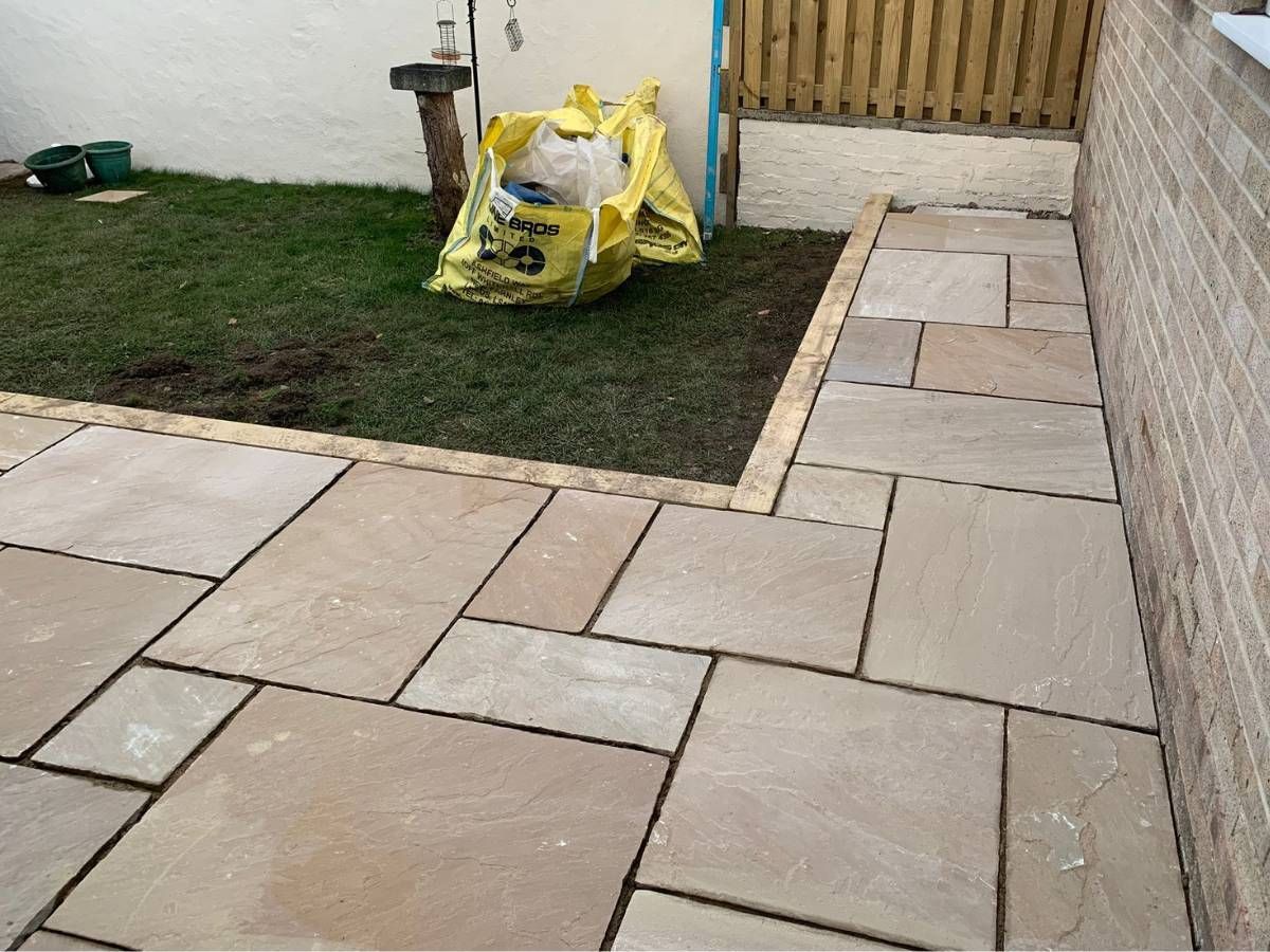 Rippon buff colour Indian paving with sleeper endging in Kirkstall