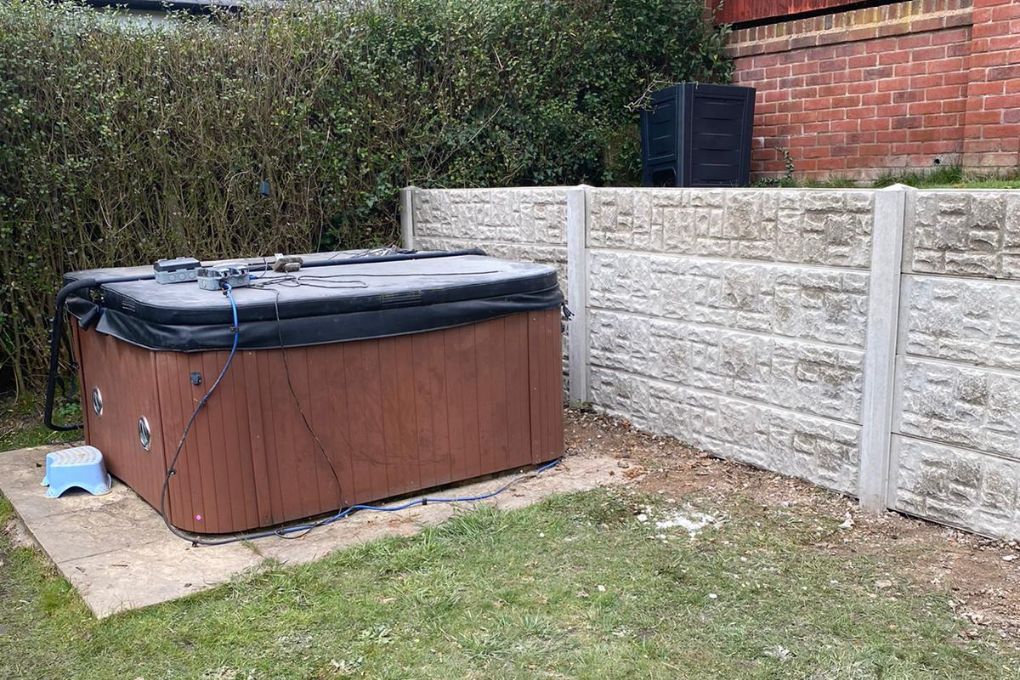 using concrete gravel boards and concrete posts for a retaining wall