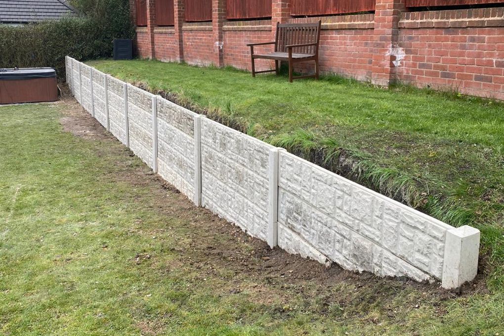 Concrete gravel board retaining wall in Leeds