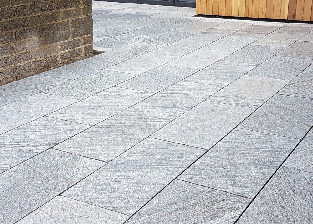 Grey marble paving with visible veining