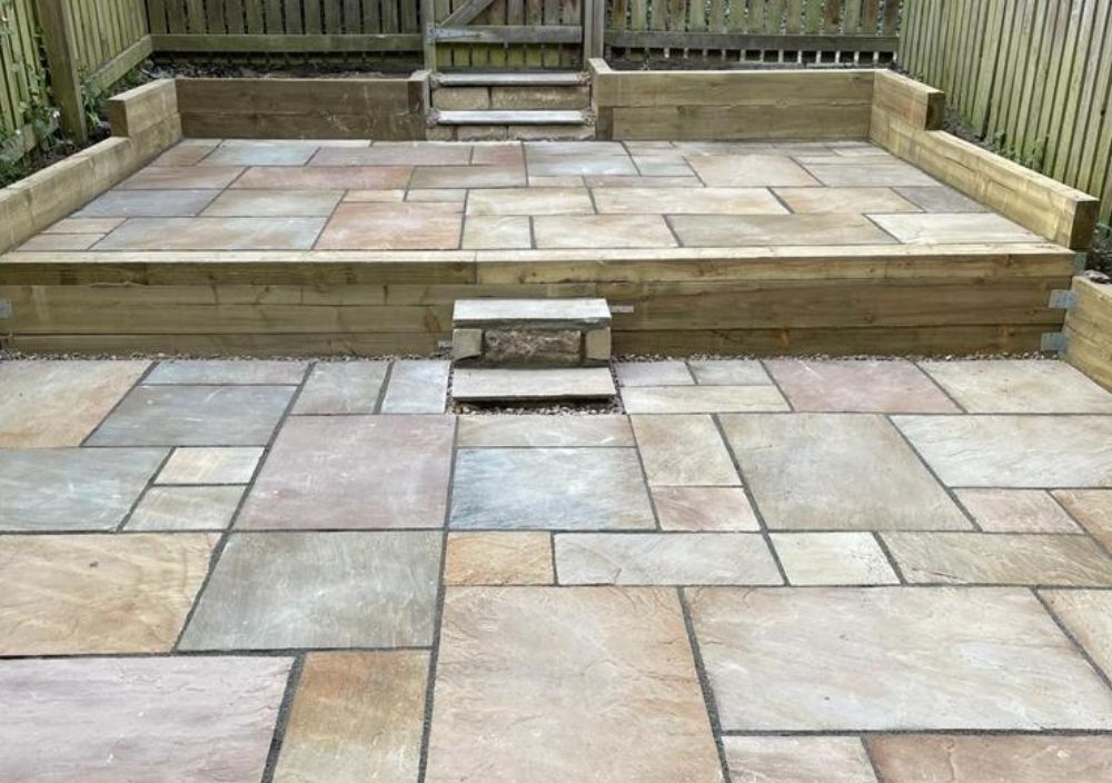 Garden patio using sandstone paving in Harehills, Leeds