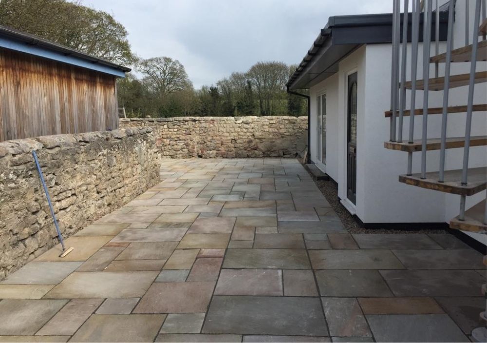 Garden patio using limestone paving in Headingley, Leeds