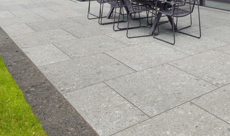 light grey porcelain paving with dark grey boarder