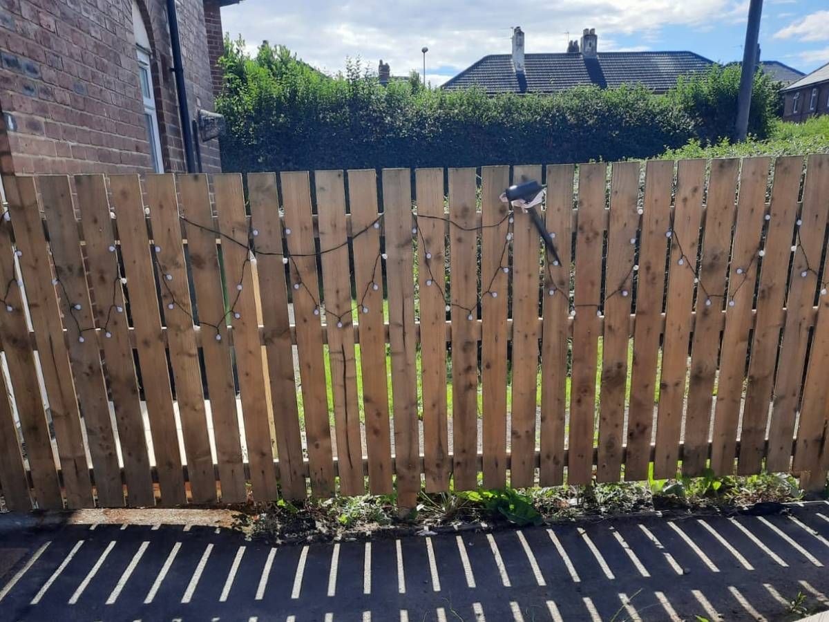 Paving Leeds flat topped picked fencing in Leeds