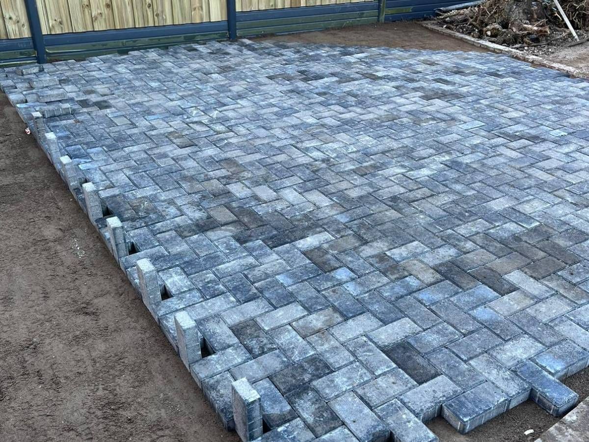 laying grey granite block paving in Leeds