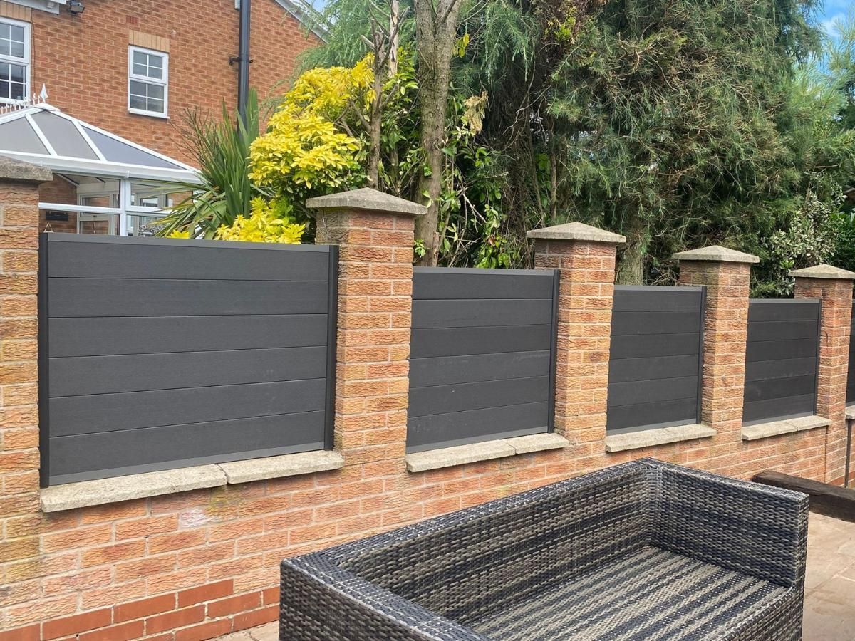 Paving Leeds smooth faced composite panels installed between brick wall pillars in Leeds