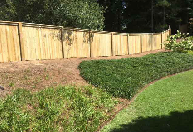 tall wooden privacy fence