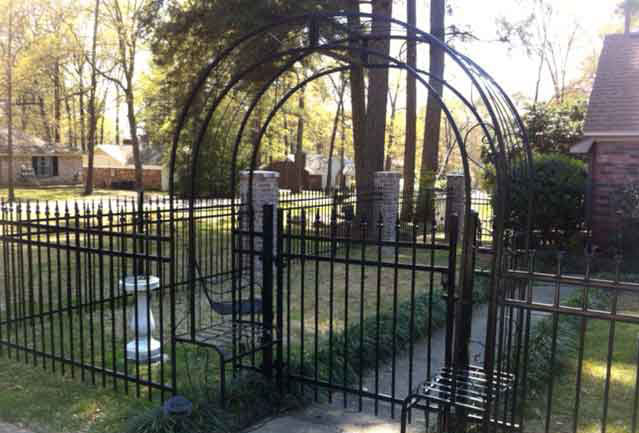 fancy wrought iron fence and gate