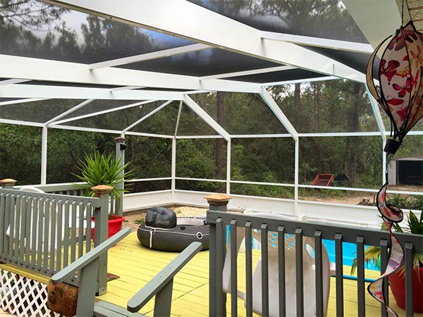 Patio cover in pool — House Replacement Windows in Citrus County, FL