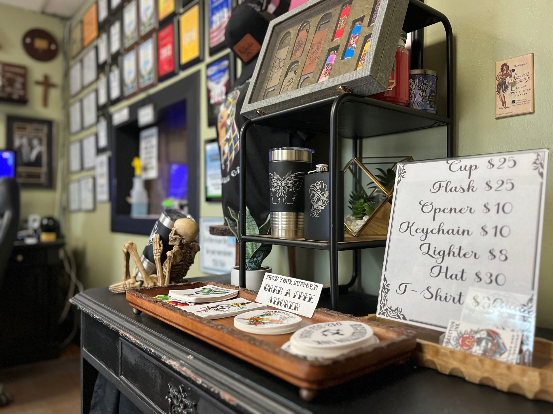 Resurrection Ink branded gift card displayed in a geometric glass terrarium with wax seal, the perfect gift for tattoo lovers
