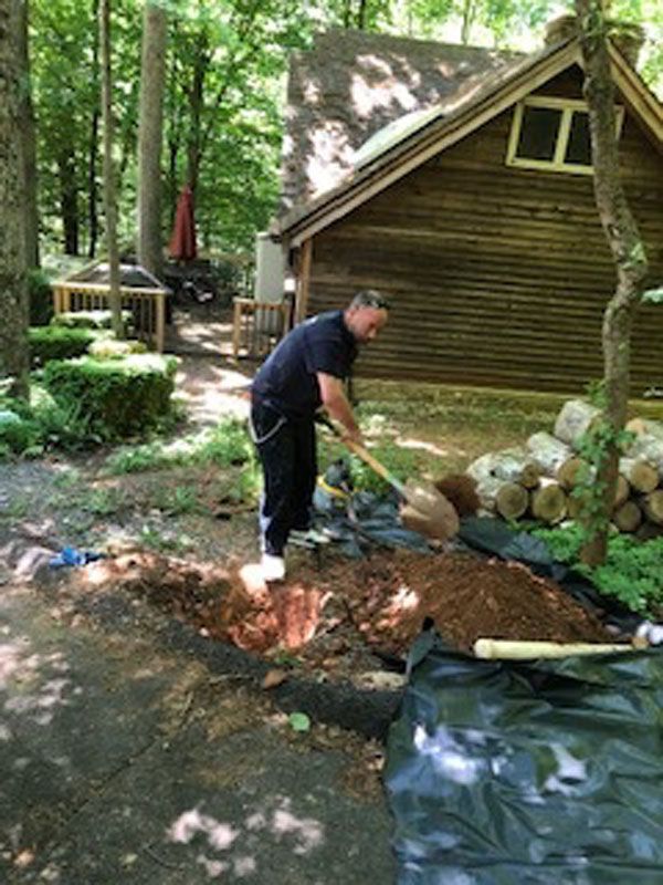 Man Is Digging a Hole