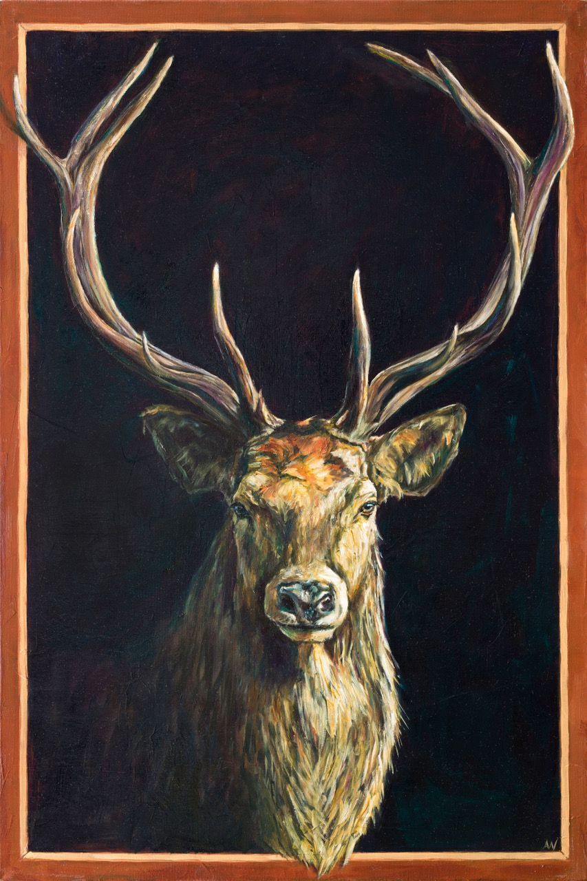 Majestic stag portrait in a brown frame; large antlers, furred chest, dark background.