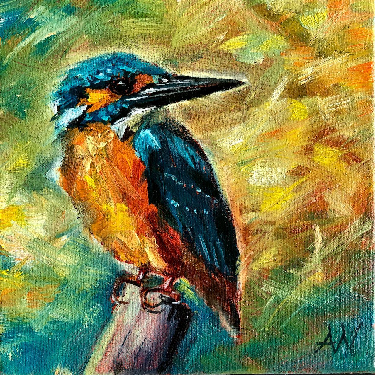 Kingfisher bird with blue, orange, and white plumage perched on a branch, against a blurred colorful background.