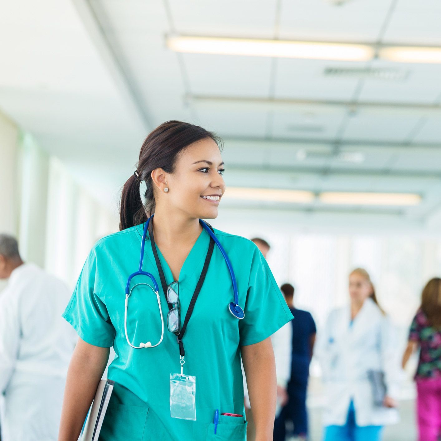 Nurse Walks In Hospital Corridor — Tulsa, OK — We Can Do More