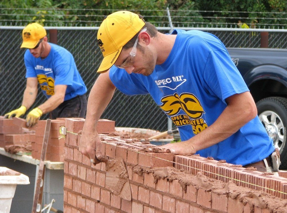 Man Cementing the Bricks — NC & SC — Tucker-Kirby Co.