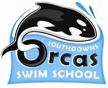 A logo for southdowns orca swim school with a killer whale in the water.